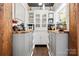 Butler's pantry featuring custom cabinetry and ample counter space at 849 Savile Ln, Fort Mill, SC 29715