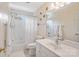 Bright bathroom with a shower-tub combo, decorative accents, and neutral tones at 9027 Kirkley Ct, Charlotte, NC 28277