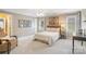 Comfortable bedroom with neutral walls, a ceiling fan, and ample natural light at 9027 Kirkley Ct, Charlotte, NC 28277