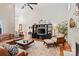Spacious living room featuring vaulted ceilings, fireplace, and modern decor at 9027 Kirkley Ct, Charlotte, NC 28277