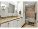 Bathroom featuring a granite countertop, white vanity and cabinetry, and access to the toilet and shower at 1009 13Th Avenue Nw Pl # 19, Hickory, NC 28601