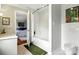 Bathroom featuring a white subway tile shower and a doorway leading into a bedroom at 1009 13Th Avenue Nw Pl # 19, Hickory, NC 28601