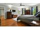 Primary bedroom with hardwood floors and a beautiful view to the outside at 1009 13Th Avenue Nw Pl # 19, Hickory, NC 28601