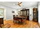 Traditional dining room featuring hardwood floors and a large china cabinet at 1009 13Th Avenue Nw Pl # 19, Hickory, NC 28601