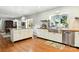 Bright kitchen with stainless steel appliances, white cabinets, and hardwood floors at 1009 13Th Avenue Nw Pl # 19, Hickory, NC 28601