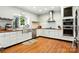 Modern kitchen with stainless steel appliances, white cabinets, subway tile backsplash, and butcher block countertops at 1009 13Th Avenue Nw Pl # 19, Hickory, NC 28601
