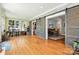 Spacious living room featuring hardwood floors and sliding barn doors leading to the dining area at 1009 13Th Avenue Nw Pl # 19, Hickory, NC 28601