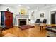Cozy living room featuring a fireplace, hardwood floors and stylish furniture at 1009 13Th Avenue Nw Pl # 19, Hickory, NC 28601