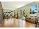 Bright sunroom with hardwood floors, many windows, and doors leading to the exterior at 1009 13Th Avenue Nw Pl # 19, Hickory, NC 28601