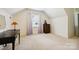 Bright bedroom space with natural light, a desk, dresser and neutral carpet at 1040 Goshen Pl, Charlotte, NC 28211