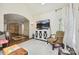 Bright and airy living room with a large TV, comfortable seating and hardwood floors at 1040 Goshen Pl, Charlotte, NC 28211