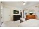 Calm main bedroom featuring built in closet, a mirror and dresser, with lots of natural light at 1040 Goshen Pl, Charlotte, NC 28211