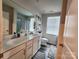 Modern bathroom with double sinks, updated fixtures, and ample counter space at 1047 Campbell Chase Sw Ln, Concord, NC 28025