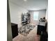 Functional home office with ample storage and shelving, workspace, and neutral decor at 1047 Campbell Chase Sw Ln, Concord, NC 28025