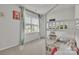 Charming bedroom featuring bunk beds, a window and a view of the outdoors at 1115 Macallum Nw Dr, Concord, NC 28027