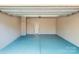 Spacious garage features epoxy floors and plenty of room for storage and parking at 1115 Macallum Nw Dr, Concord, NC 28027