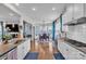 Open kitchen and dining area with lots of natural light and stainless steel appliances at 1115 Macallum Nw Dr, Concord, NC 28027