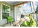 Relaxing patio features comfortable seating, a glass-topped table, and backyard views at 1115 Macallum Nw Dr, Concord, NC 28027