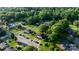 An aerial shot of a community with tree-lined streets and manicured lawns at 1124 St. Charles Ct # 3, Newton, NC 28658
