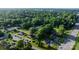 An aerial view of a neighborhood nestled amongst verdant, mature trees at 1124 St. Charles Ct # 3, Newton, NC 28658