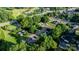 Aerial view of a tranquil neighborhood surrounded by lush, mature trees at 1124 St. Charles Ct # 3, Newton, NC 28658