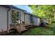 View of the wooden deck with sliding glass doors, great for outdoor entertaining and relaxation at 1124 St. Charles Ct # 3, Newton, NC 28658