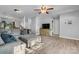 Bright open-concept living room featuring a large gray sectional at 1124 St. Charles Ct # 3, Newton, NC 28658