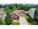 Lovely two-story home with an inviting porch and two-car garage, surrounded by mature trees at 1152 Mckee Farm Ln, Belmont, NC 28012