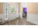 Inviting entryway with stylish floors, leading into a brightly decorated home office space at 1152 Mckee Farm Ln, Belmont, NC 28012