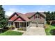 Charming two-story home with a welcoming front porch and well-manicured lawn, inviting curb appeal at 1152 Mckee Farm Ln, Belmont, NC 28012