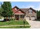 Charming two-story home with a welcoming front porch and well-manicured lawn, inviting curb appeal at 1152 Mckee Farm Ln, Belmont, NC 28012