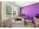 Bright office space with a large window and modern decor, creating an ideal work-from-home environment at 1152 Mckee Farm Ln, Belmont, NC 28012