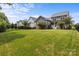 A well-manicured backyard with lush lawn and fence, perfect for outdoor activities and relaxation at 124 Slocumb Ln, Mooresville, NC 28117