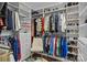 Spacious walk-in closet with custom shelving and ample storage for clothes and accessories at 124 Slocumb Ln, Mooresville, NC 28117
