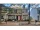 Charming two-story townhome with inviting front porch and well-maintained landscaping at 12450 Stone Garden Dr, Huntersville, NC 28078