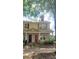 Charming two-story townhome with inviting front porch and well-maintained landscaping at 12450 Stone Garden Dr, Huntersville, NC 28078