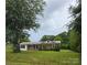 Charming single-story brick home with a well-manicured lawn and inviting curb appeal at 125 Heritage View Rd, Hickory, NC 28601