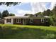 Charming single-story brick home with a well-manicured lawn and inviting curb appeal at 125 Heritage View Rd, Hickory, NC 28601