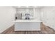 Bright kitchen with white quartz countertops and a spacious center island at 135 Utility Ln # C, Mooresville, NC 28117
