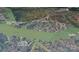 Breathtaking aerial view of the community, showcasing its prime waterfront location at 13934 Kings Carriage Ln, Charlotte, NC 28278