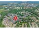 Expansive aerial view of property highlighting its proximity to Ballantyne and lush greenery at 14222 Richmond Park Ave, Charlotte, NC 28277