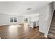 Bright open-concept living space with hardwood floors and access to the patio at 1450 Mammoth Rd, Hickory, NC 28602