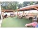 Outdoor patio with multiple seating areas and a well-maintained turf at 1505 Clarendon Pl, Rock Hill, SC 29732