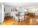 Bright dining room features hardwood floors, stylish lighting and easy access to kitchen at 1505 Clarendon Pl, Rock Hill, SC 29732