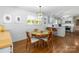 Inviting dining area leading to a modern kitchen, perfect for entertaining and Gathering meals at 1505 Clarendon Pl, Rock Hill, SC 29732