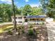 Charming exterior of home with manicured landscaping, brick accents, and lush greenery at 1505 Clarendon Pl, Rock Hill, SC 29732