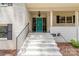 Inviting front porch featuring white brick steps and a bright turquoise door at 1505 Clarendon Pl, Rock Hill, SC 29732