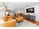 Open concept living room with hardwood floors and easy access to kitchen and dining room at 1505 Clarendon Pl, Rock Hill, SC 29732
