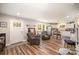 Open-concept living area with hardwood floors, modern furnishings, and natural light at 161 Ranson Rd, Lancaster, SC 29720