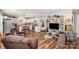 Spacious living room seamlessly connects to a modern kitchen with hardwood floors at 161 Ranson Rd, Lancaster, SC 29720